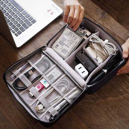 Keep your cables managed with this $9 electronics organizer