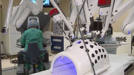 Robots help surgeons do what their hands can't do