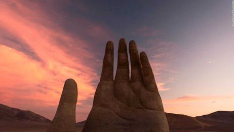 Monument or mirage? Hand rises from the desert 
