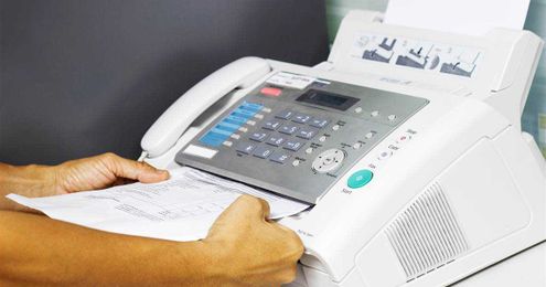 Britain just called fax machines 'archaic' and 'absurd' — so why are Americans still using them?