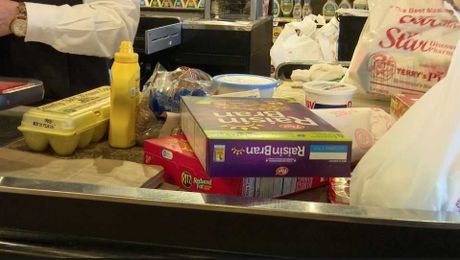 Local grocer says customers are buying more than just “bread and milk”