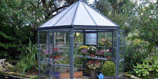 A Mini Greenhouse Will Totally Upgrade Even the Tiniest Backyard 