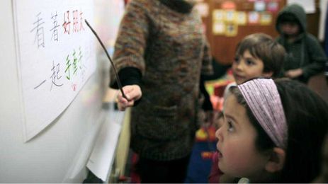 Across languages, brains process abstract and concrete words differently