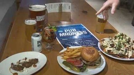 Celebrate "Pub Madness" with brews, burgers and basketball at 10 Barrel Brewing