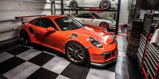 Make Yours a Dream Garage with a Cool New Epoxy or Tile Floor