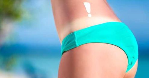 Addicted To Your Tanning Bed? Your Genes And Mental Health May Both Play A Role