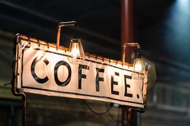 Can You Spot The Bizarre Optical Illusion This Coffee Sign Makes?