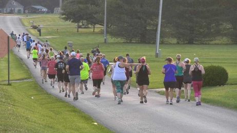 VIDEO: Over 100 race at 4th annual Stuff the Bus Family Fun Run