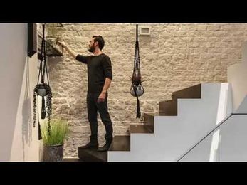 Find Out How to Design an Ultra-Tiny Apartment with Walls of Cabinets