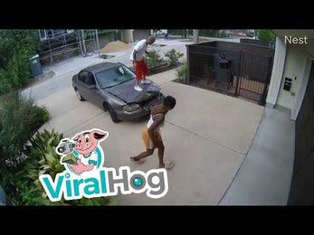 WATCH: Guy Does Some Quick Body Work in a Driveway