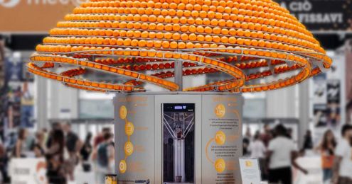 Eco-friendly juice kiosk creates cups from its own orange peels
