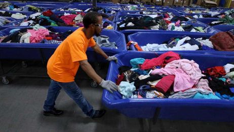 Where do your donated clothes go? Take a trip behind the scenes at Goodwill to find out