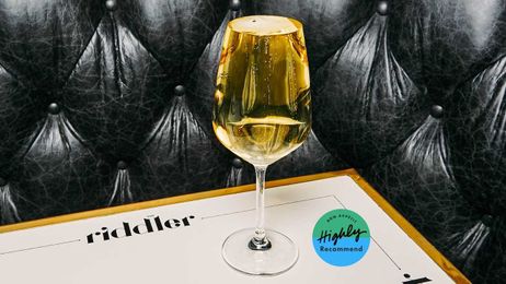 Go to The Riddler. Get Your Wine Glass Filled to the Brim.