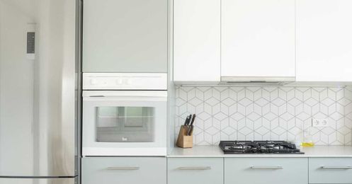 How to Clean Kitchen Cabinets So the Entire Room Shines