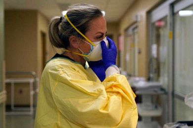 Swamped US hospitals scramble to find nurses to care for COVID-19 patients