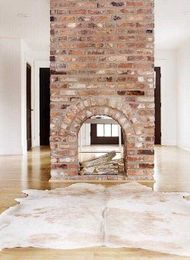 25 Trendy Fireplaces To Bring Coziness In