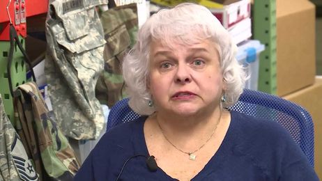 Woman repurposes military uniforms to honor vets