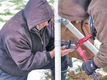 Temporary fence system allows for easy field grazing