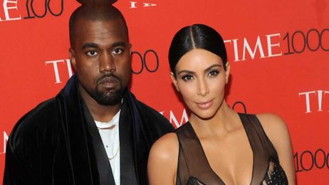Kim Kardashian and Kanye West discussing divorce, sources say