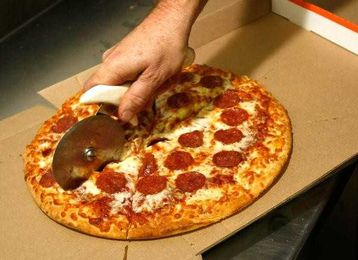 WATCH: Man Runs Water Over Pizza To Cool It Down
