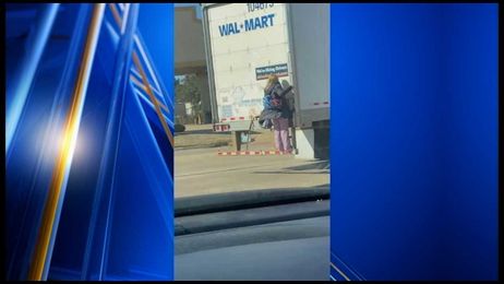 Caught on video: Woman hitches ride on semitrailer truck in Arkansas