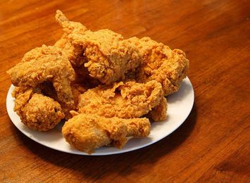 Ugly Side Effects of Eating Fried Chicken, According to Science