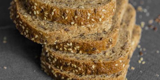 Here's Why You Should Toss A Loaf Of Ezekiel Bread In Your Grocery Cart 