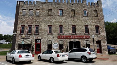 New owners transform Old Stone Mill into Eclectic Design and Antiques