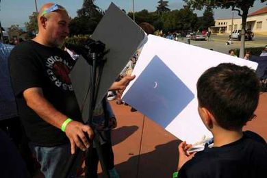 Want to view the annular eclipse safely? Grab a box and get crafty