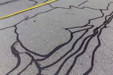 What Should I Do to Repair My Asphalt Driveway Cracks?