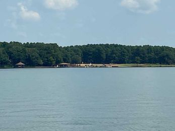 Divers work to pull newly discovered machine, trailer out of Lake Cypress