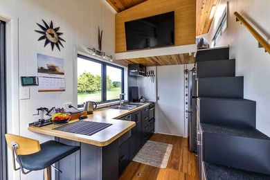 Retiree's Sleek DIY Off-Grid Tiny House Has Its Own Coffee Bar