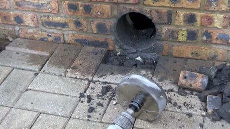 How to Drill a Large Hole in a Brick Wall