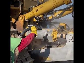 Sandblasting a Cat D10T.