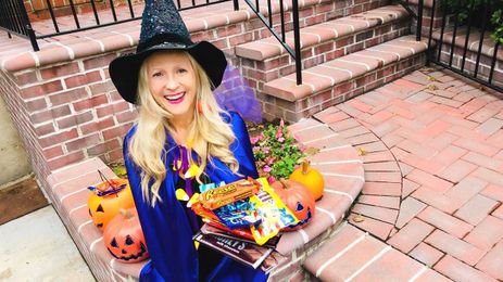 Want to be the Halloween hero of your neighborhood? Give out full-size candy bars
