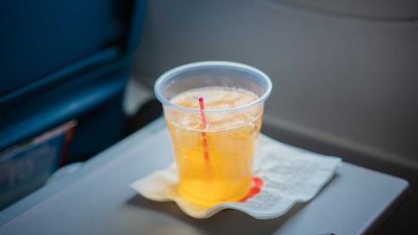An ex-flight attendant explains how to get free drinks on a flight