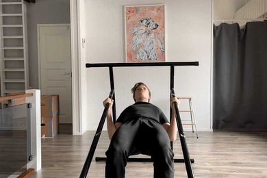 My favorite home workout equipment is a portable pull up bar